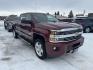 2015 Maroon /Brown Chevrolet Silverado 2500HD High Country (1GC1KXEG8FF) with an 6.0L engine, Automatic transmission, located at 116 5th Avenue South, Lewistown, MT, 59457, 47.063877, -109.427879 - Looking for a powerful and luxurious truck that can handle any job? This 2015 Chevrolet Silverado 2500HD Crew Cab High Country with a 6.0L gas engine is the perfect choice. In excellent condition, this truck is ready to meet all your work and play needs. The 2015 Chevrolet Silverado 2500HD High C - Photo#0