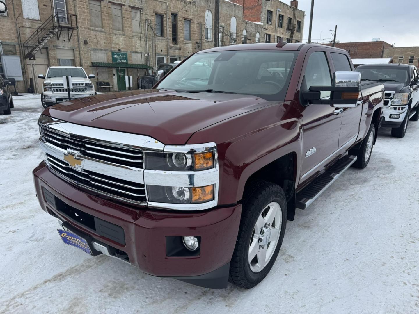 2015 Maroon /Brown Chevrolet Silverado 2500HD High Country (1GC1KXEG8FF) with an 6.0L engine, Automatic transmission, located at 116 5th Avenue South, Lewistown, MT, 59457, 47.063877, -109.427879 - Looking for a powerful and luxurious truck that can handle any job? This 2015 Chevrolet Silverado 2500HD Crew Cab High Country with a 6.0L gas engine is the perfect choice. In excellent condition, this truck is ready to meet all your work and play needs. The 2015 Chevrolet Silverado 2500HD High C - Photo#5