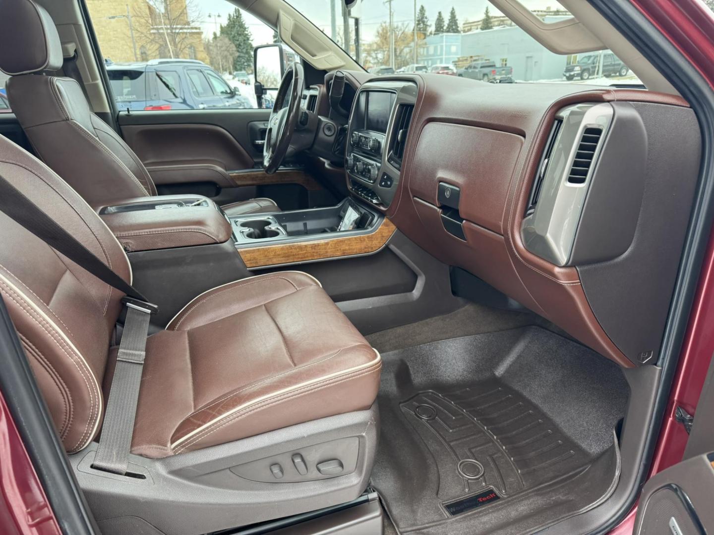 2015 Maroon /Brown Chevrolet Silverado 2500HD High Country (1GC1KXEG8FF) with an 6.0L engine, Automatic transmission, located at 116 5th Avenue South, Lewistown, MT, 59457, 47.063877, -109.427879 - Looking for a powerful and luxurious truck that can handle any job? This 2015 Chevrolet Silverado 2500HD Crew Cab High Country with a 6.0L gas engine is the perfect choice. In excellent condition, this truck is ready to meet all your work and play needs. The 2015 Chevrolet Silverado 2500HD High C - Photo#6