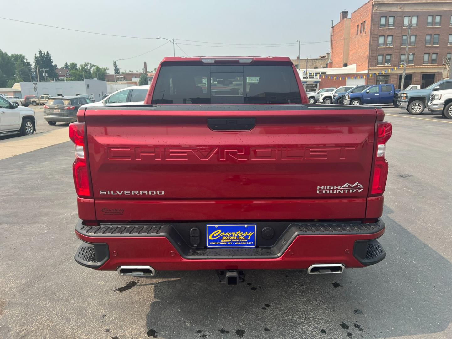 2021 Maroon /Black Chevrolet Silverado 1500 High Country (1GCUYHELXMZ) with an 6.2L DI V8 engine, Automatic transmission, located at 116 5th Avenue South, Lewistown, MT, 59457, 47.063877, -109.427879 - Discover the luxury and power of the 2021 Chevrolet Silverado 1500 Crew Cab High Country 4WD. This exceptional truck combines sophisticated design with robust performance, featuring: Luxurious leather-appointed interior with heated and ventilated front seats Advanced 4WD system for superior trac - Photo#4