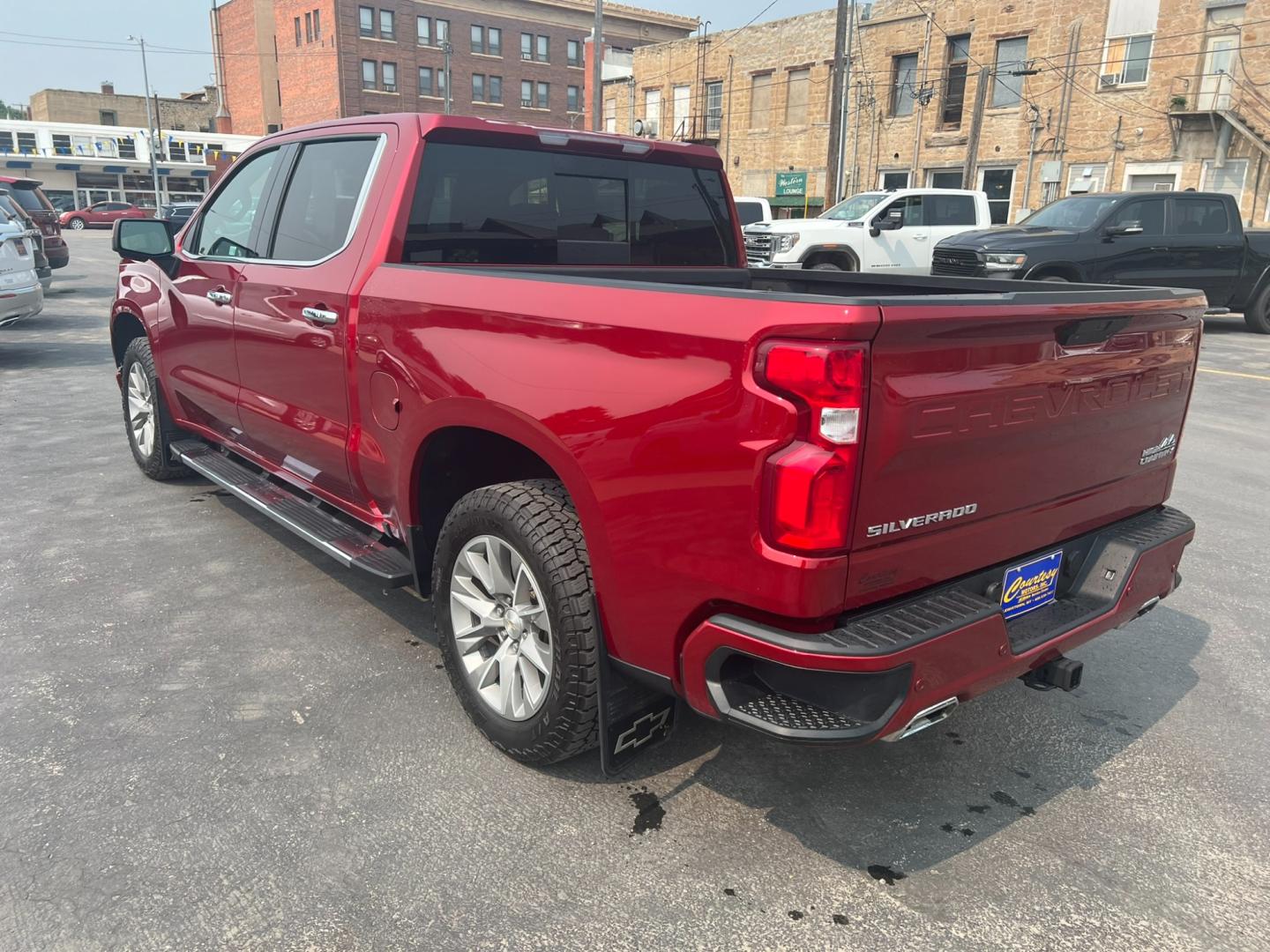 2021 Maroon /Black Chevrolet Silverado 1500 High Country (1GCUYHELXMZ) with an 6.2L DI V8 engine, Automatic transmission, located at 116 5th Avenue South, Lewistown, MT, 59457, 47.063877, -109.427879 - Discover the luxury and power of the 2021 Chevrolet Silverado 1500 Crew Cab High Country 4WD. This exceptional truck combines sophisticated design with robust performance, featuring: Luxurious leather-appointed interior with heated and ventilated front seats Advanced 4WD system for superior trac - Photo#6