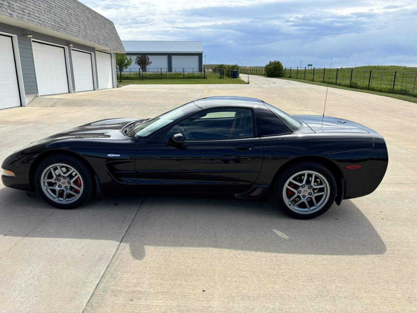 2002 /Black/Red Chevrolet Corvette Z06 (1G1YY12S225) with an 5.7L V8 OHV 16V engine, 6-Speed Manual Overdrive transmission, located at 116 5th Avenue South, Lewistown, MT, 59457, 47.063877, -109.427879 - One owner, clean Car Fax, always stored in climate controlled garage, low mile ZO6! New extra set of tires included. **THIS VEHICLE IS A CUSTOMER CONSIGNMENT AND IS ONLY AVAILABLE TO VIEW BY APPOINTMENT TO QUALIFIED BUYERS** - Photo#0