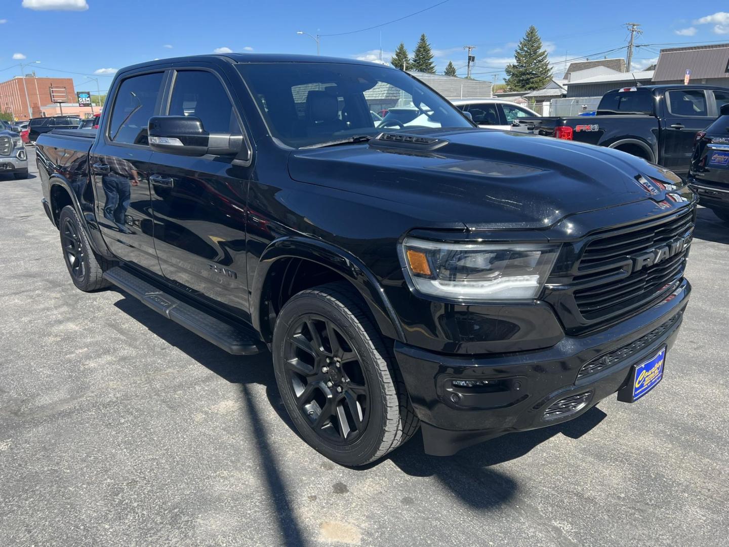 2021 Black /Black RAM 1500 Laramie Crew Cab SWB 4WD (1C6SRFJT8MN) with an 5.7L V8 OHV 16V engine, 8A transmission, located at 116 5th Avenue South, Lewistown, MT, 59457, 47.063877, -109.427879 - Photo#0