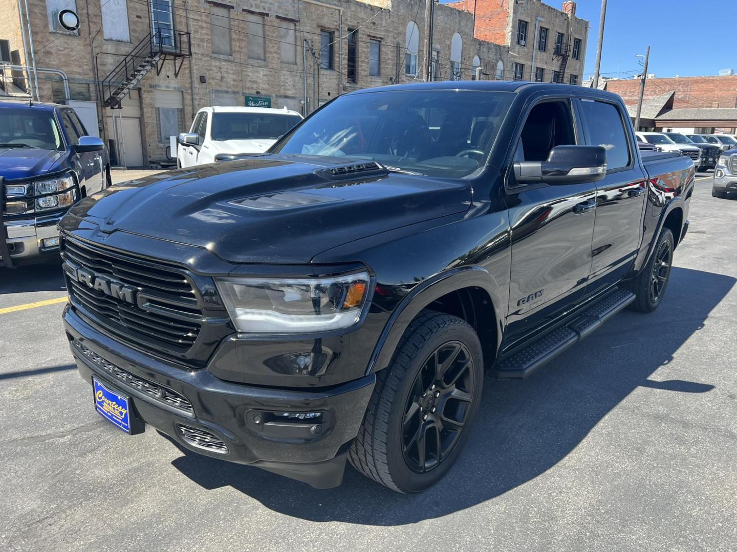 2021 Black /Black RAM 1500 Laramie Crew Cab SWB 4WD (1C6SRFJT8MN) with an 5.7L V8 OHV 16V engine, 8A transmission, located at 116 5th Avenue South, Lewistown, MT, 59457, 47.063877, -109.427879 - 2021 Ram 1500 Laramie Crew Cab 4WD, powered by a robust 5.7L HEMI engine. This truck combines luxury with rugged capability, offering premium leather seating, advanced technology features, and superior towing capacity. The spacious crew cab ensures comfort for all passengers, while the 4WD system gi - Photo#5