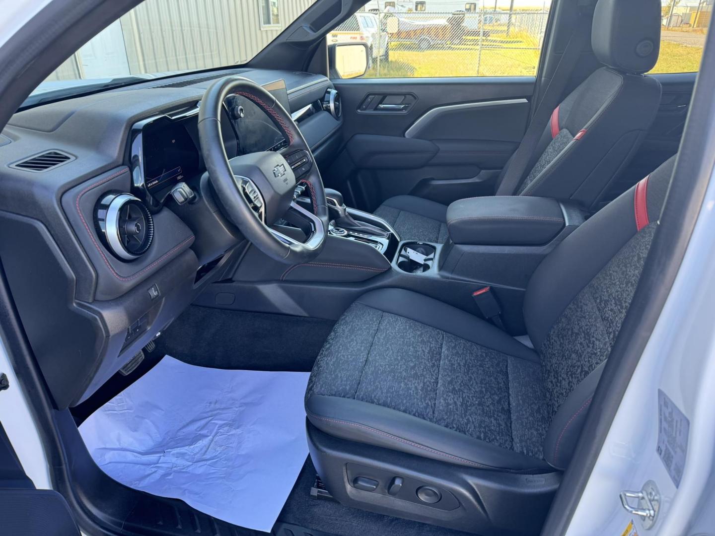 2023 WHITE /Charcoal Chevrolet Colorado Z71 Crew Cab 4WD (1GCPTDEK2P1) with an 2.7L L4 DOHC 16V TURBO engine, 6A transmission, located at 116 5th Avenue South, Lewistown, MT, 59457, 47.063877, -109.427879 - Experience power and versatility with the 2023 Chevrolet Colorado Z71 Crew Cab 4WD. This rugged truck is built to handle any terrain, offering a bold design and the capability you need for both work and play. Equipped with a robust 4WD system, it ensures confident performance on all surfaces, while - Photo#11