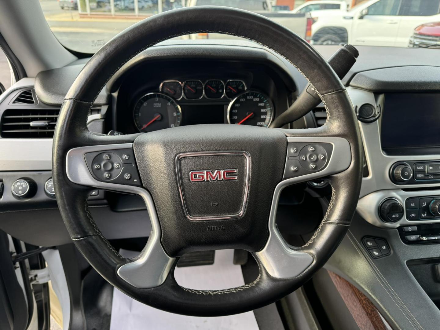 2017 WHITE /Black GMC Yukon SLT 4WD (1GKS2BKC2HR) with an 5.3L V8 OHV 16V FFV engine, 6A transmission, located at 116 5th Avenue South, Lewistown, MT, 59457, 47.063877, -109.427879 - Upgrade your journey with this pre-owned 2017 GMC Yukon SLT 4WD, a perfect blend of luxury and power. With its robust 4WD system, this SUV is built to handle all types of terrain while offering a smooth, comfortable ride. The spacious interior is designed with premium materials, accommodating up to - Photo#15