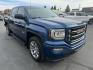 2017 Blue /Charcoal GMC Sierra 1500 SLT Crew Cab Short Box 4WD (3GTU2NEC0HG) with an 5.3L V8 OHV 16V engine, 6A transmission, located at 116 5th Avenue South, Lewistown, MT, 59457, 47.063877, -109.427879 - 2017 GMC Sierra 1500 Crew Cab All Terrain 4WD. This truck is equipped with a powerful 5.3L V8 engine, providing excellent towing capacity and smooth performance. The All Terrain package includes an upgraded suspension for off-road capabilities, and the four-wheel drive system ensures superior handli - Photo#0