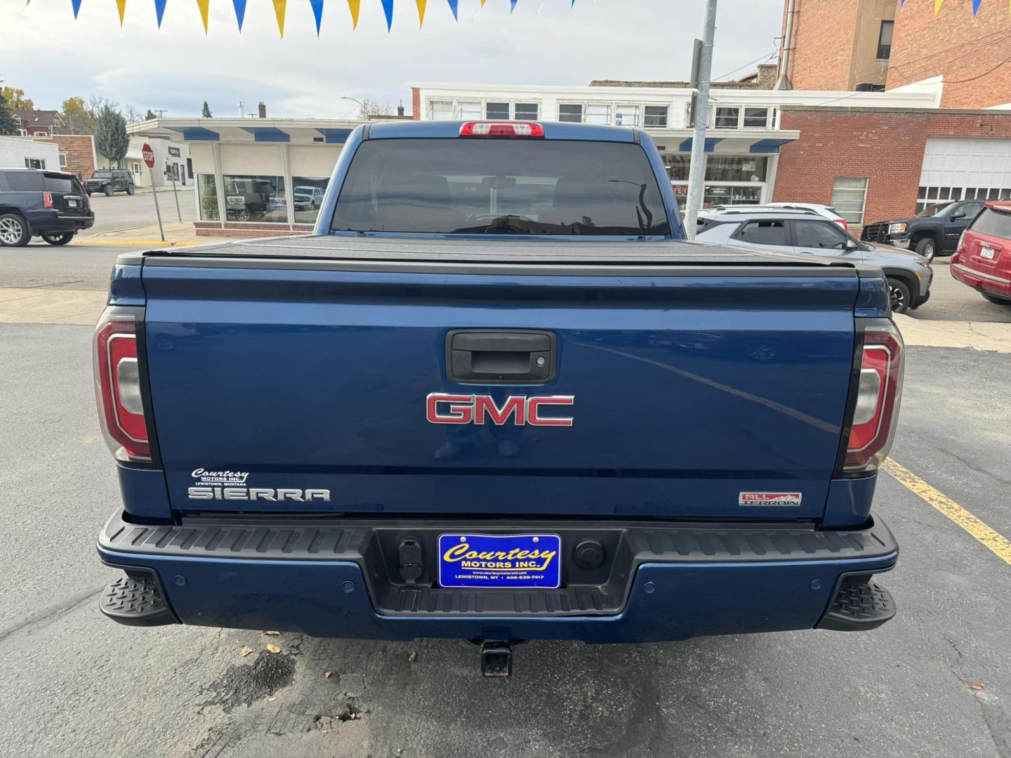 2017 Blue /Charcoal GMC Sierra 1500 SLT Crew Cab Short Box 4WD (3GTU2NEC0HG) with an 5.3L V8 OHV 16V engine, 6A transmission, located at 116 5th Avenue South, Lewistown, MT, 59457, 47.063877, -109.427879 - Photo#3