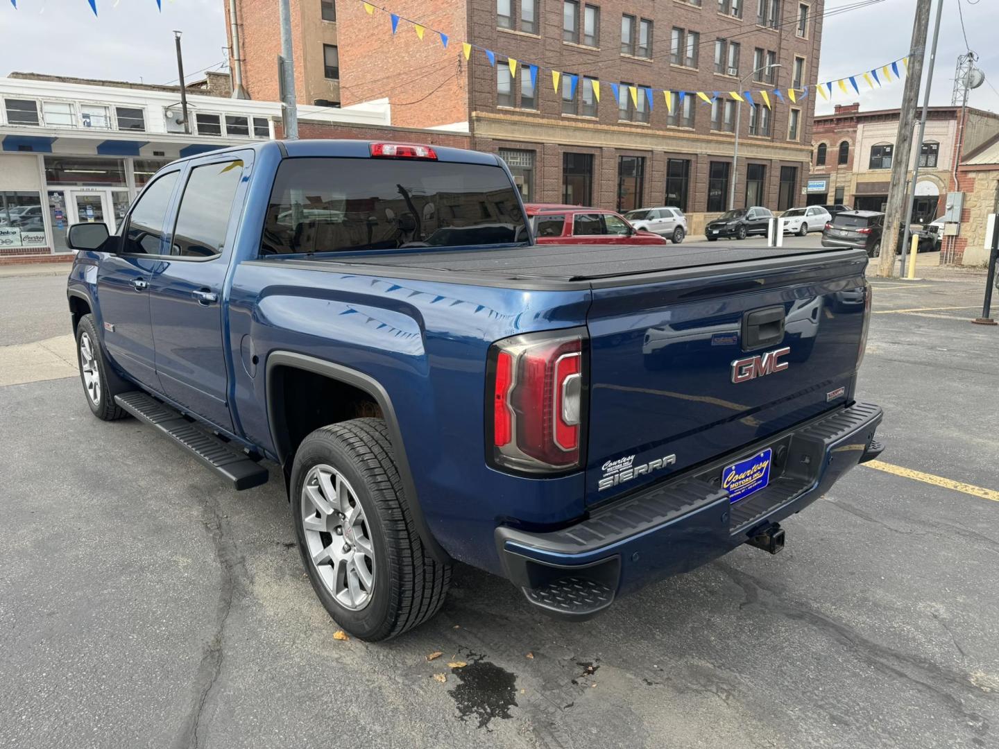 2017 Blue /Charcoal GMC Sierra 1500 SLT Crew Cab Short Box 4WD (3GTU2NEC0HG) with an 5.3L V8 OHV 16V engine, 6A transmission, located at 116 5th Avenue South, Lewistown, MT, 59457, 47.063877, -109.427879 - Photo#5