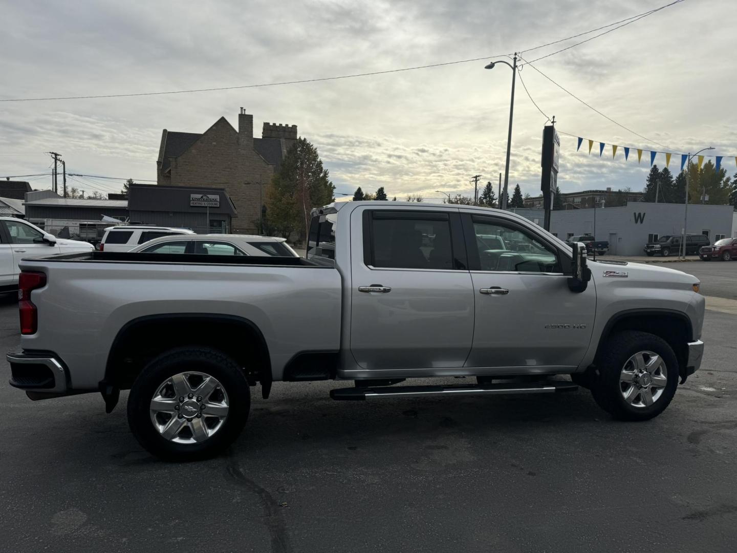 2020 silver /Black Chevrolet Silverado 2500HD LTZ Crew Cab Short Box 4WD (1GC4YPE75LF) with an 6.6L V8 OHV 16V engine, 6A transmission, located at 116 5th Avenue South, Lewistown, MT, 59457, 47.063877, -109.427879 - Photo#1