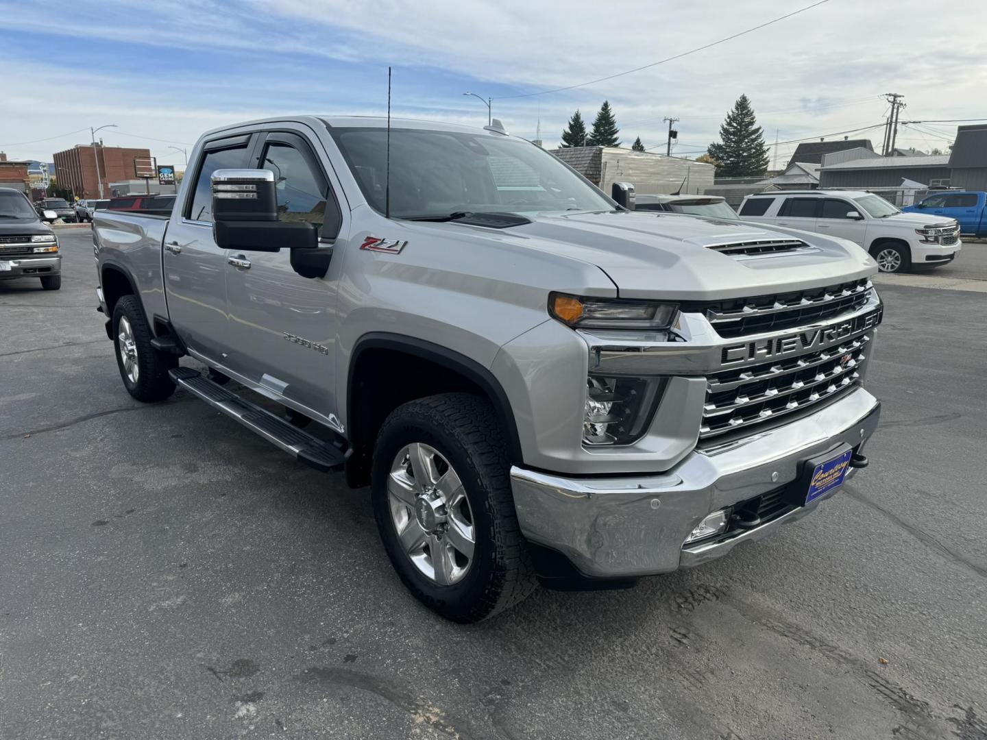 2020 silver /Black Chevrolet Silverado 2500HD LTZ Crew Cab Short Box 4WD (1GC4YPE75LF) with an 6.6L V8 OHV 16V engine, 6A transmission, located at 116 5th Avenue South, Lewistown, MT, 59457, 47.063877, -109.427879 - 2020 Chevrolet Silverado 2500HD Crew Cab LTZ 4WD with a powerful 6.6L gas engine. This heavy-duty truck offers exceptional towing and hauling capabilities, making it perfect for both work and play. The LTZ trim provides a premium experience with a refined interior that includes leather-appointed sea - Photo#0