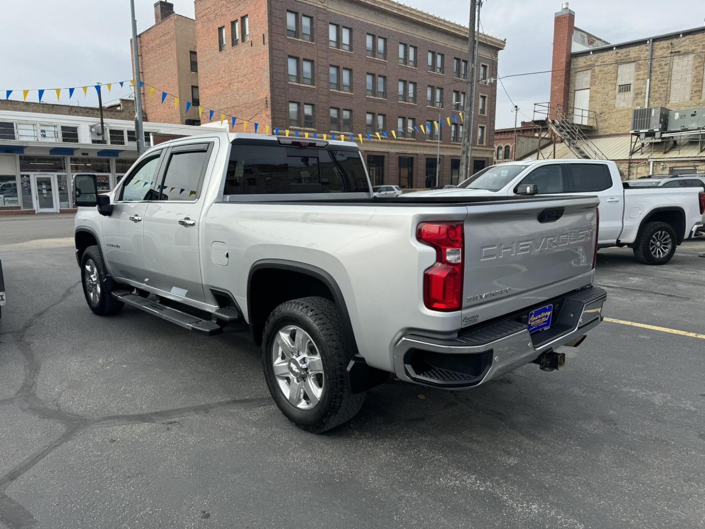 2020 silver /Black Chevrolet Silverado 2500HD LTZ Crew Cab Short Box 4WD (1GC4YPE75LF) with an 6.6L V8 OHV 16V engine, 6A transmission, located at 116 5th Avenue South, Lewistown, MT, 59457, 47.063877, -109.427879 - 2020 Chevrolet Silverado 2500HD Crew Cab LTZ 4WD with a powerful 6.6L gas engine. This heavy-duty truck offers exceptional towing and hauling capabilities, making it perfect for both work and play. The LTZ trim provides a premium experience with a refined interior that includes leather-appointed sea - Photo#5