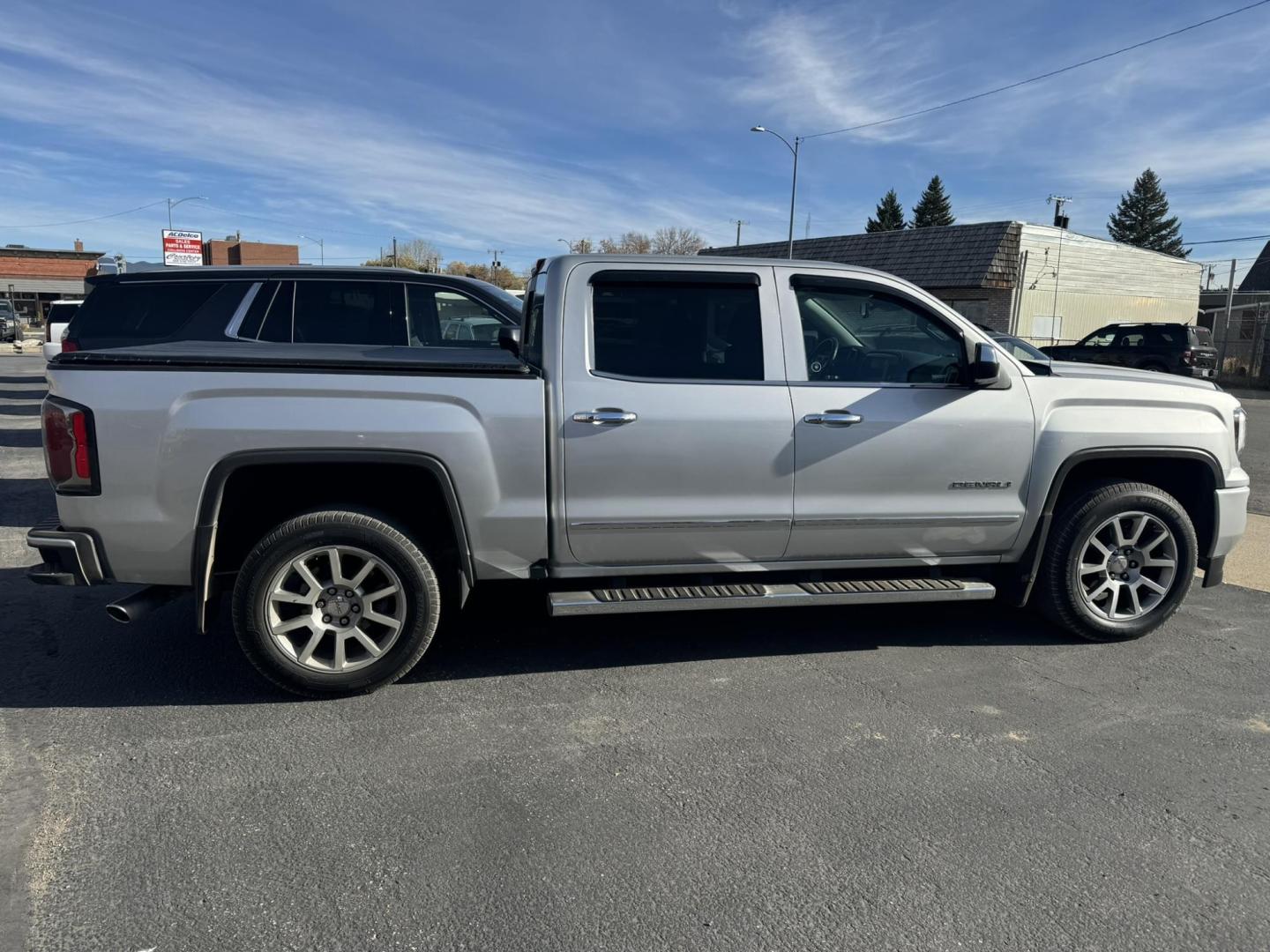 2018 silver /Black GMC Sierra 1500 Denali Crew Cab Long Box 4WD (3GTU2PEJ4JG) with an 6.2L V8 OHV 16V engine, 6A transmission, located at 116 5th Avenue South, Lewistown, MT, 59457, 47.063877, -109.427879 - Photo#1