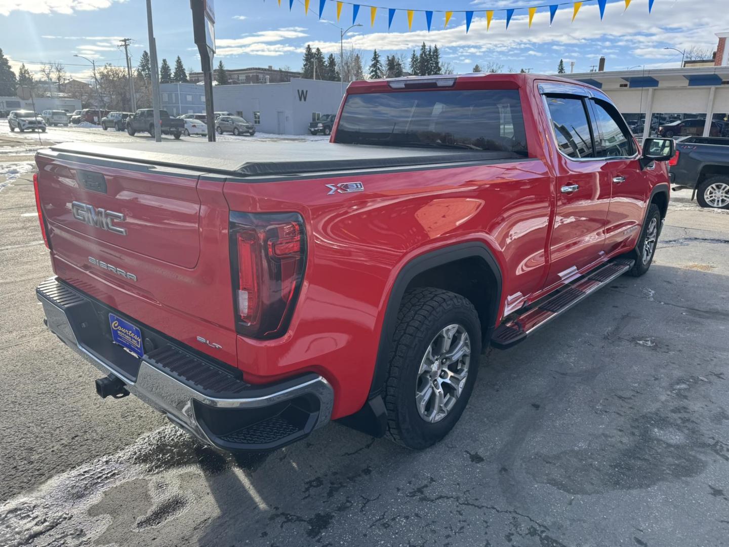 2021 Red /Grey GMC Sierra 1500 SLT Crew Cab Standard Box 4WD (3GTU9DEL9MG) with an 6.2L V8 OHV 16V engine, 6A transmission, located at 116 5th Avenue South, Lewistown, MT, 59457, 47.063877, -109.427879 - Discover the perfect blend of power, luxury, and capability with this 2021 GMC Sierra 1500 Crew Cab SLT 4WD, equipped with a robust 6.2L gas engine. Designed to elevate your driving experience, this truck offers exceptional performance, premium features, and the versatility to tackle any challenge. - Photo#1