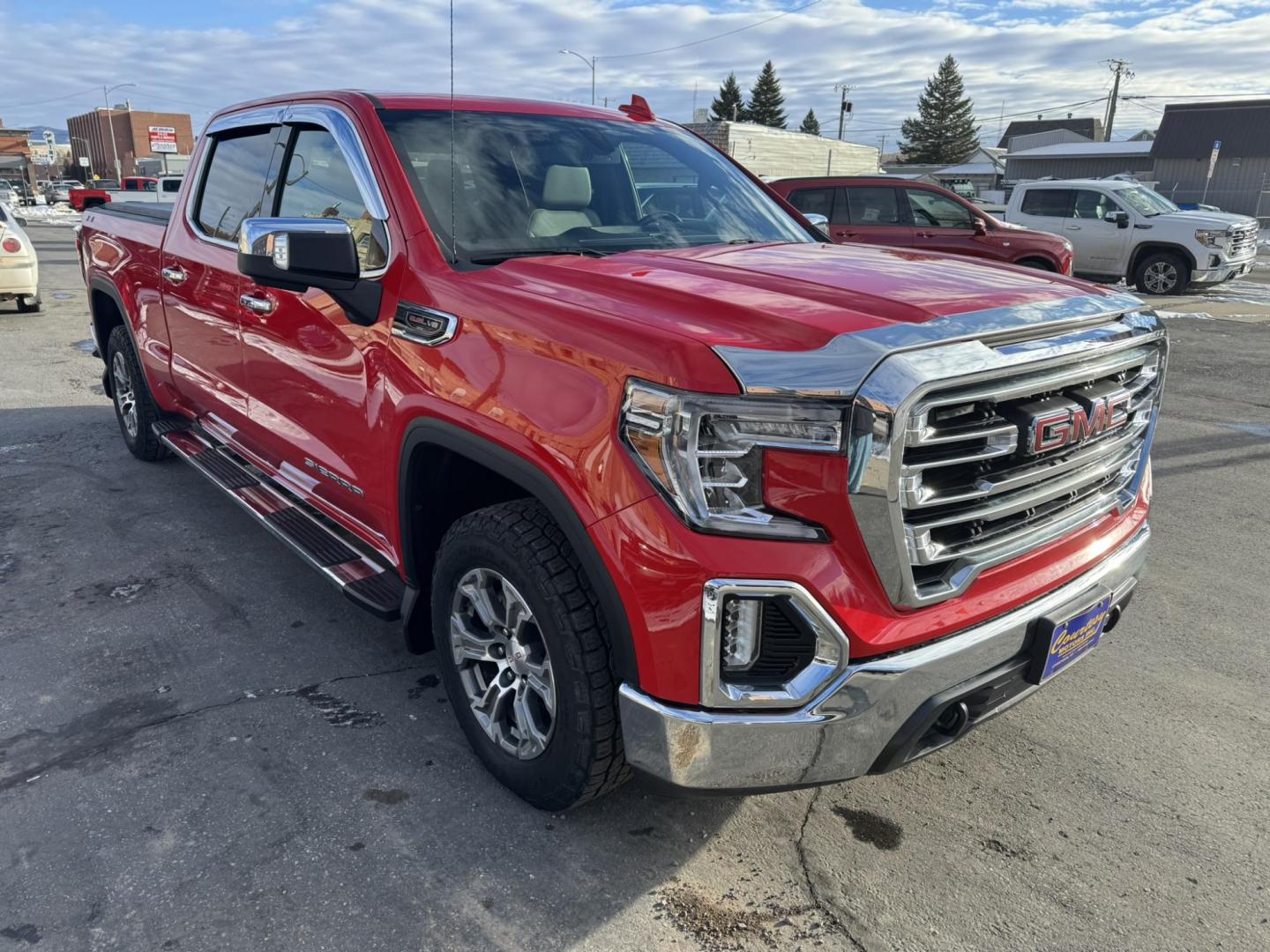 2021 Red /Grey GMC Sierra 1500 SLT Crew Cab Standard Box 4WD (3GTU9DEL9MG) with an 6.2L V8 OHV 16V engine, 6A transmission, located at 116 5th Avenue South, Lewistown, MT, 59457, 47.063877, -109.427879 - Discover the perfect blend of power, luxury, and capability with this 2021 GMC Sierra 1500 Crew Cab SLT 4WD, equipped with a robust 6.2L gas engine. Designed to elevate your driving experience, this truck offers exceptional performance, premium features, and the versatility to tackle any challenge. - Photo#0