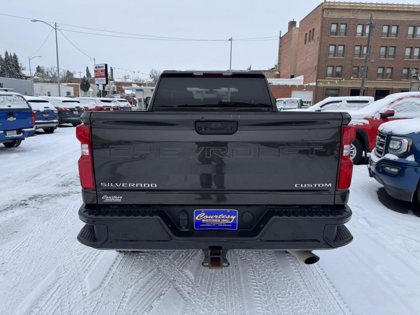 2020 Brown /Black Chevrolet Silverado 2500HD Custom Crew Cab Short Box 4WD (1GC4YME79LF) with an 6.6L V8 OHV 16V engine, 6A transmission, located at 116 5th Avenue South, Lewistown, MT, 59457, 47.063877, -109.427879 - Experience the power and reliability of this 2020 Chevrolet Silverado 2500HD Custom 4WD, built to handle tough jobs and everyday driving with ease. Equipped with a 6.6L V8 gas engine, this truck delivers impressive towing capacity and performance, making it the perfect choice for work or adventure. - Photo#2