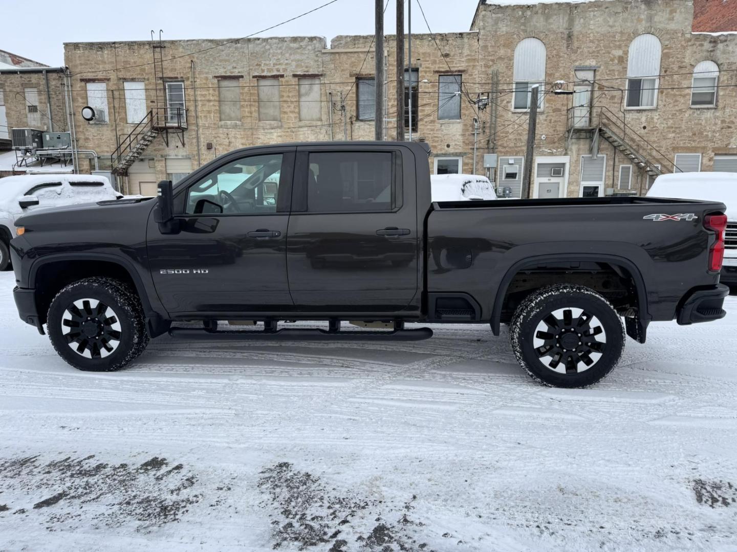 2020 Brown /Black Chevrolet Silverado 2500HD Custom Crew Cab Short Box 4WD (1GC4YME79LF) with an 6.6L V8 OHV 16V engine, 6A transmission, located at 116 5th Avenue South, Lewistown, MT, 59457, 47.063877, -109.427879 - Experience the power and reliability of this 2020 Chevrolet Silverado 2500HD Custom 4WD, built to handle tough jobs and everyday driving with ease. Equipped with a 6.6L V8 gas engine, this truck delivers impressive towing capacity and performance, making it the perfect choice for work or adventure. - Photo#5