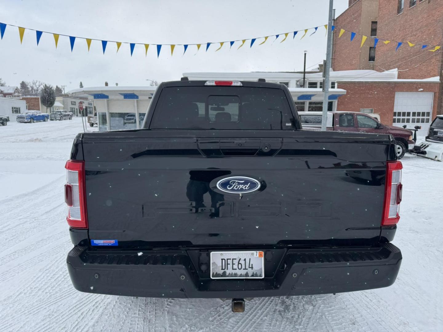 2021 Black /Black Ford F-150 XL SuperCrew 6.5-ft. Bed 4WD (1FTFW1ED6MF) with an 3.5L V6 DOHC 16V HYBRID engine, 6A transmission, located at 116 5th Avenue South, Lewistown, MT, 59457, 47.063877, -109.427879 - Upgrade to power, efficiency, and luxury with this 2021 Ford F-150 Lariat SuperCrew 4WD Hybrid. Designed for strength and innovation, this truck features a powerful yet fuel-efficient hybrid engine that delivers outstanding performance without compromising capability. The spacious SuperCrew cab prov - Photo#1