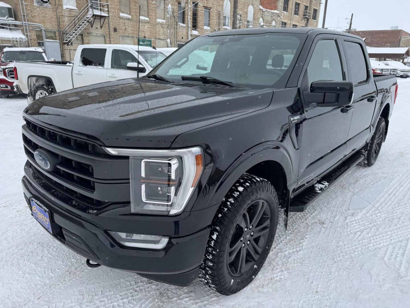 2021 Black /Black Ford F-150 XL SuperCrew 6.5-ft. Bed 4WD (1FTFW1ED6MF) with an 3.5L V6 DOHC 16V HYBRID engine, 6A transmission, located at 116 5th Avenue South, Lewistown, MT, 59457, 47.063877, -109.427879 - Upgrade to power, efficiency, and luxury with this 2021 Ford F-150 Lariat SuperCrew 4WD Hybrid. Designed for strength and innovation, this truck features a powerful yet fuel-efficient hybrid engine that delivers outstanding performance without compromising capability. The spacious SuperCrew cab prov - Photo#4