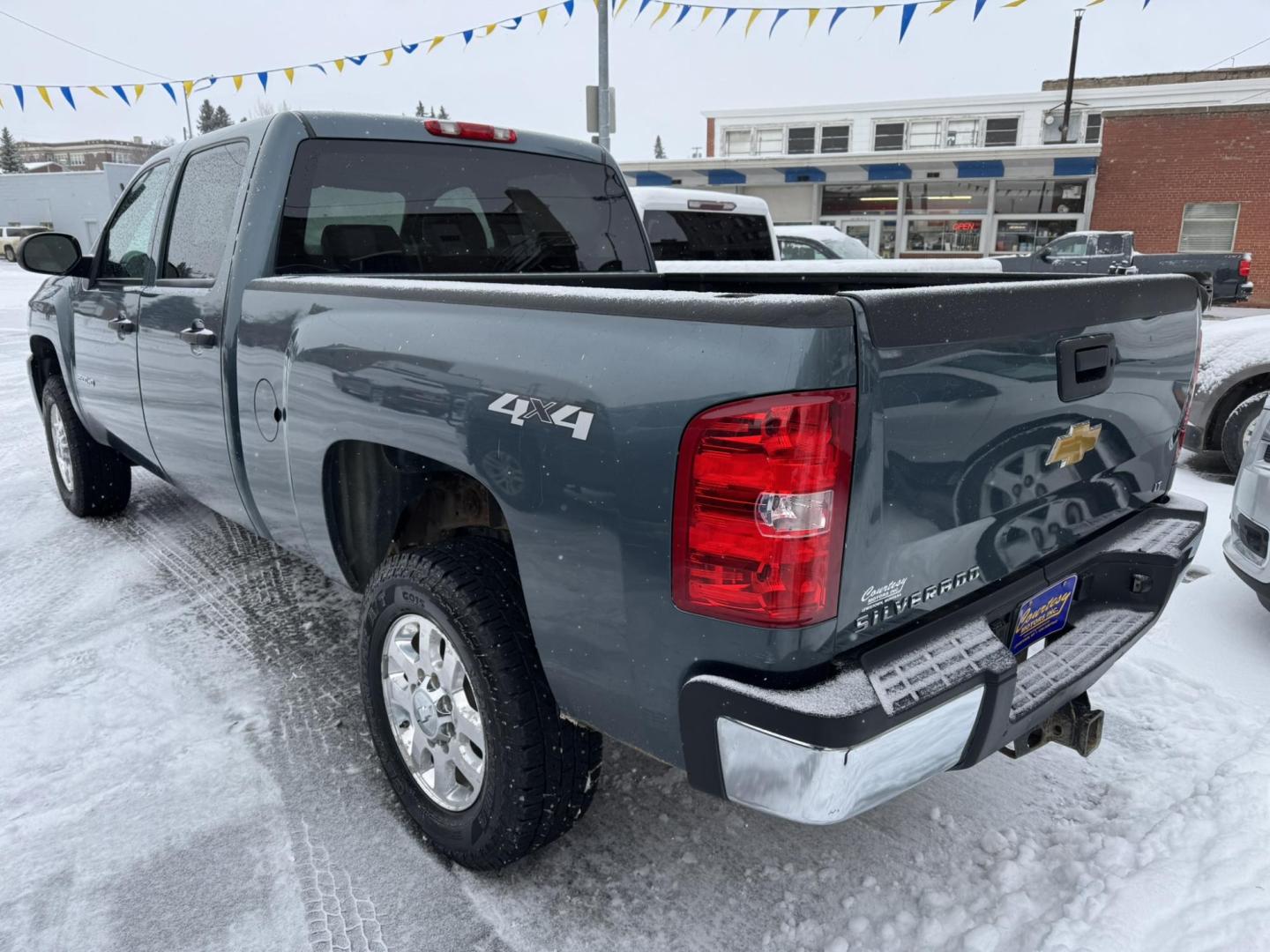 2014 Blue /Grey Chevrolet Silverado 2500HD LT Crew Cab 4WD (1GC1KXCG6EF) with an 6.0L V8 OHV 16V FFV engine, 6-Speed Automatic transmission, located at 116 5th Avenue South, Lewistown, MT, 59457, 47.063877, -109.427879 - Photo#1