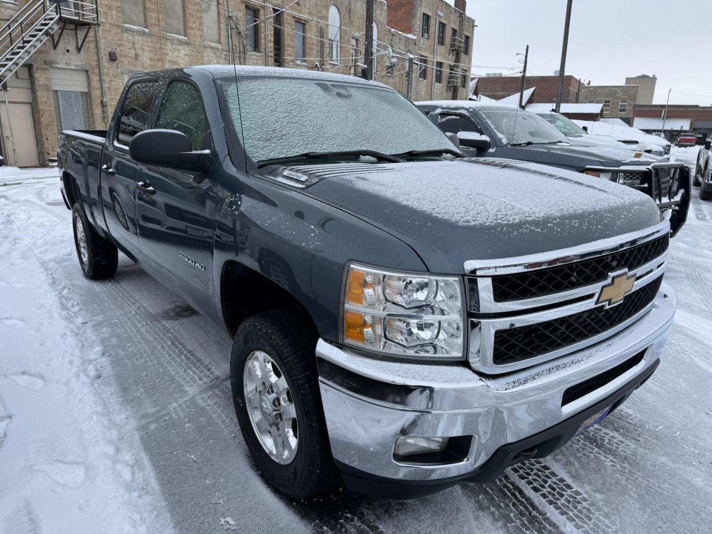 2014 Blue /Grey Chevrolet Silverado 2500HD LT Crew Cab 4WD (1GC1KXCG6EF) with an 6.0L V8 OHV 16V FFV engine, 6-Speed Automatic transmission, located at 116 5th Avenue South, Lewistown, MT, 59457, 47.063877, -109.427879 - Photo#3