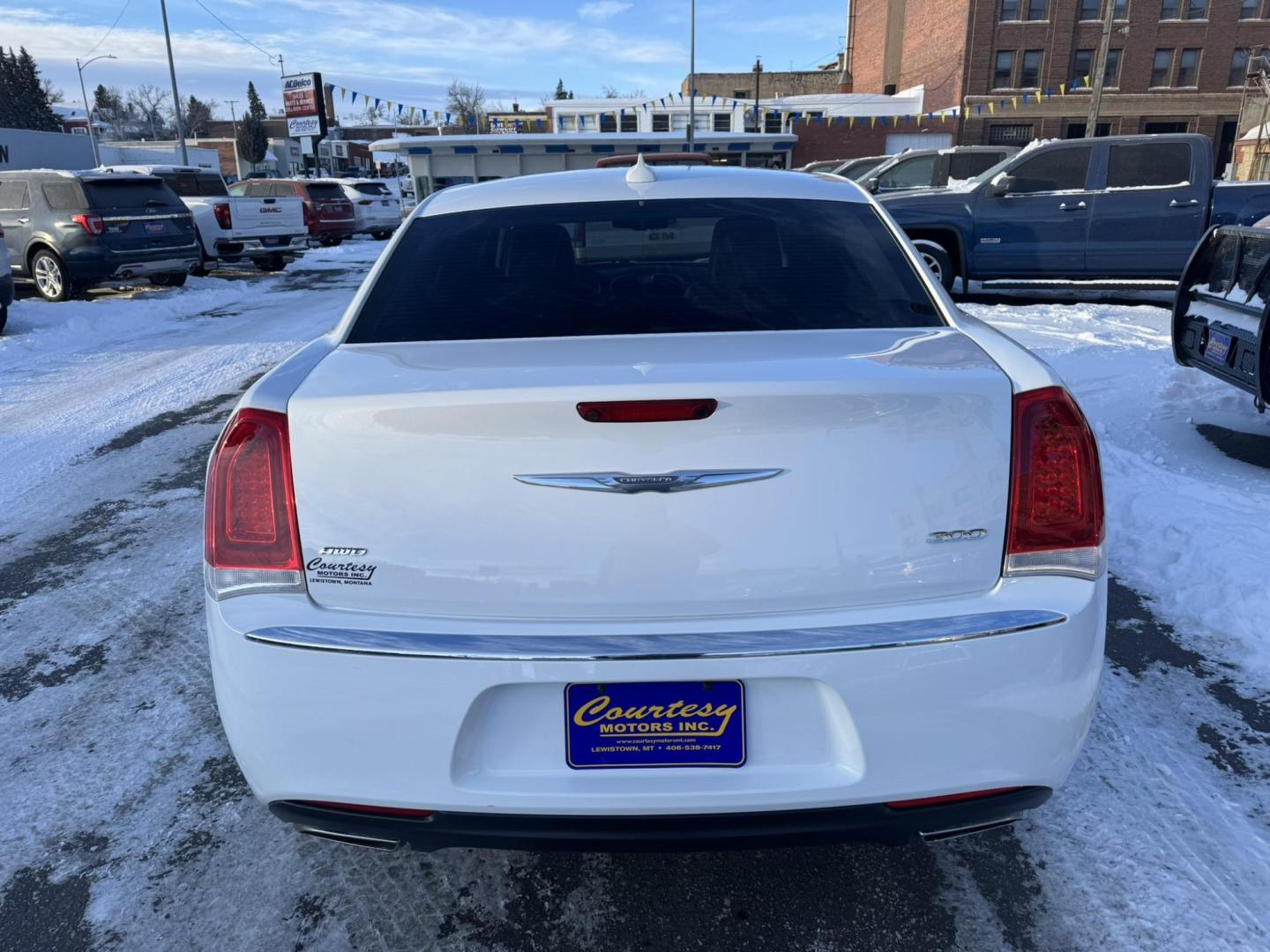 2016 WHITE /Black Chrysler 300 Limited AWD (2C3CCARG7GH) with an 3.6L V6 SOHC 24V engine, 8A transmission, located at 116 5th Avenue South, Lewistown, MT, 59457, 47.063877, -109.427879 - For sale: a stunning 2016 Chrysler 300 Limited AWD Anniversary Edition, a perfect blend of luxury, performance, and all-weather capability. This special edition sedan stands out with its bold design, premium finishes, and advanced features. The all-wheel-drive system provides confidence on any road, - Photo#1