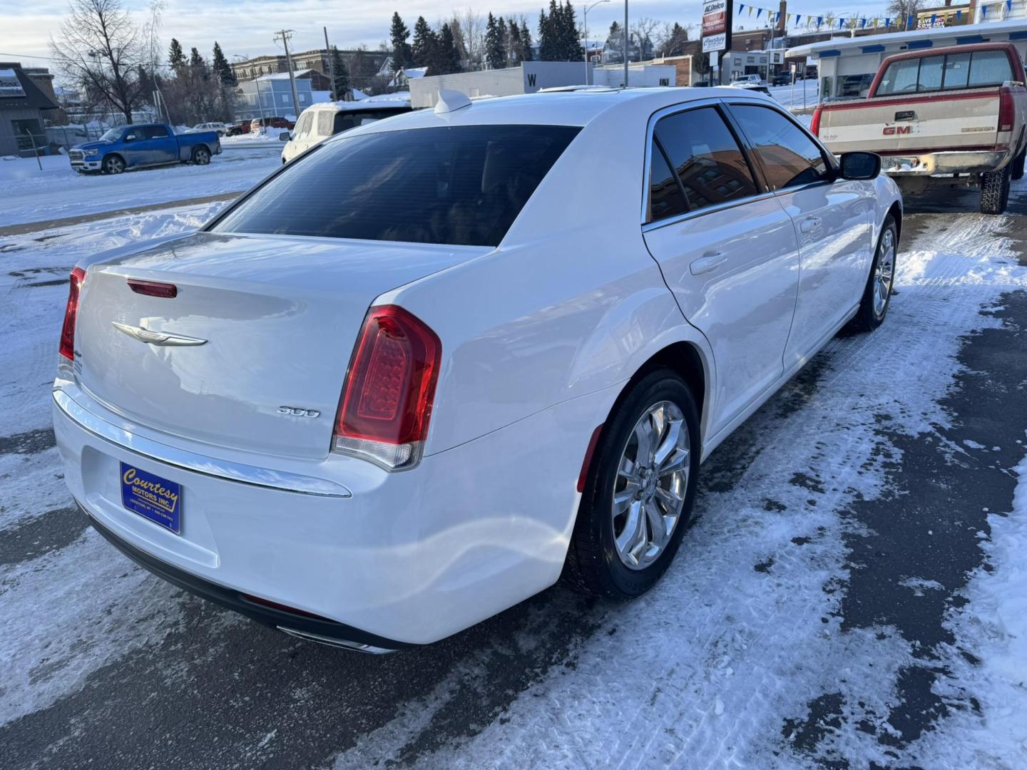 2016 WHITE /Black Chrysler 300 Limited AWD (2C3CCARG7GH) with an 3.6L V6 SOHC 24V engine, 8A transmission, located at 116 5th Avenue South, Lewistown, MT, 59457, 47.063877, -109.427879 - For sale: a stunning 2016 Chrysler 300 Limited AWD Anniversary Edition, a perfect blend of luxury, performance, and all-weather capability. This special edition sedan stands out with its bold design, premium finishes, and advanced features. The all-wheel-drive system provides confidence on any road, - Photo#2