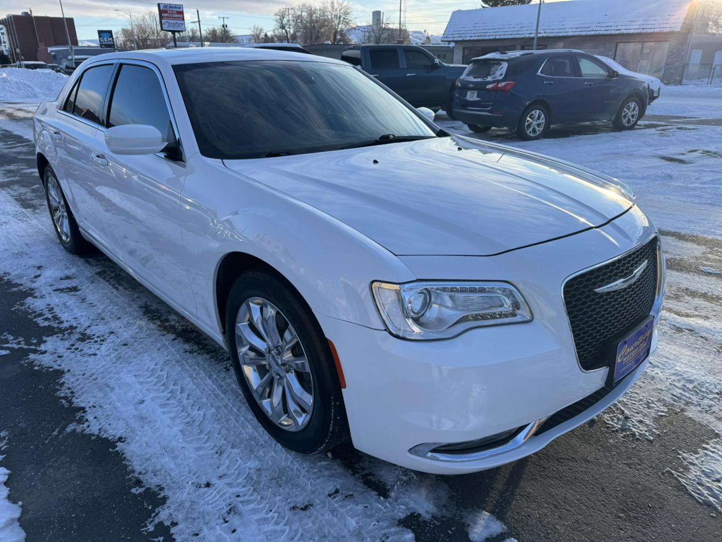 2016 WHITE /Black Chrysler 300 Limited AWD (2C3CCARG7GH) with an 3.6L V6 SOHC 24V engine, 8A transmission, located at 116 5th Avenue South, Lewistown, MT, 59457, 47.063877, -109.427879 - For sale: a stunning 2016 Chrysler 300 Limited AWD Anniversary Edition, a perfect blend of luxury, performance, and all-weather capability. This special edition sedan stands out with its bold design, premium finishes, and advanced features. The all-wheel-drive system provides confidence on any road, - Photo#0