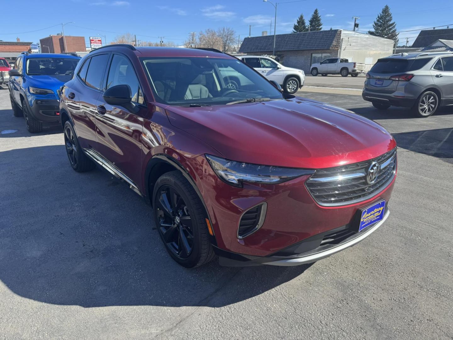 2023 Maroon /Grey Buick Envision Essense AWD (LRBFZPR44PD) with an 2.0L L4 DOHC 24V TURBO engine, 6A transmission, located at 116 5th Avenue South, Lewistown, MT, 59457, 47.063877, -109.427879 - Photo#1