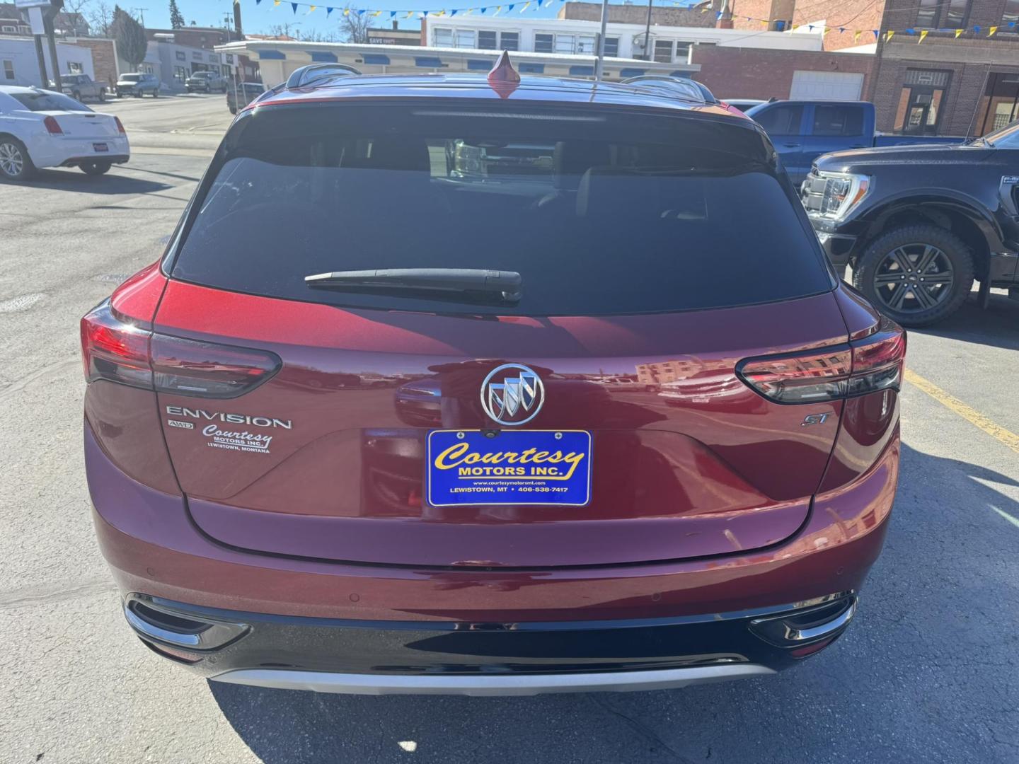 2023 Maroon /Grey Buick Envision Essense AWD (LRBFZPR44PD) with an 2.0L L4 DOHC 24V TURBO engine, 6A transmission, located at 116 5th Avenue South, Lewistown, MT, 59457, 47.063877, -109.427879 - Photo#4