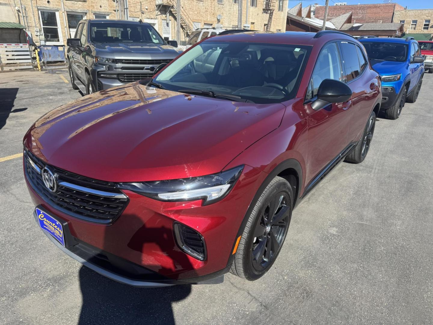 2023 Maroon /Grey Buick Envision Essense AWD (LRBFZPR44PD) with an 2.0L L4 DOHC 24V TURBO engine, 6A transmission, located at 116 5th Avenue South, Lewistown, MT, 59457, 47.063877, -109.427879 - Photo#0