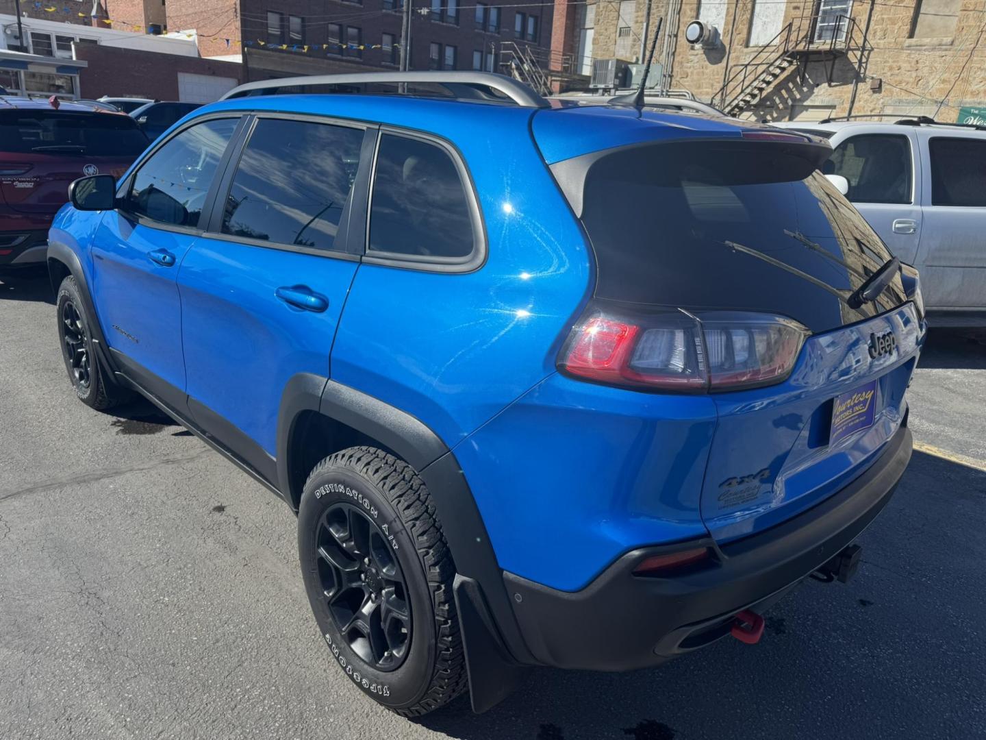 2021 Blue /Black Jeep Cherokee Trailhawk 4WD (1C4PJMBX8MD) with an 3.2L V6 DOHC 24V engine, 9A transmission, located at 116 5th Avenue South, Lewistown, MT, 59457, 47.063877, -109.427879 - Photo#2