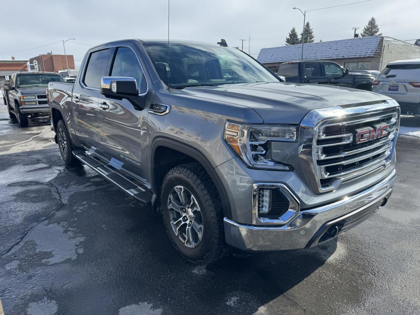 2020 Grey /Black GMC Sierra 1500 SLT Crew Cab Short Box 4WD (1GTU9DED5LZ) with an 5.3L V8 OHV 16V engine, 6A transmission, located at 116 5th Avenue South, Lewistown, MT, 59457, 47.063877, -109.427879 - 2020 GMC Sierra 1500 Crew Cab SLT 4WD—powerful, refined, and built to handle anything you throw its way. This truck combines rugged capability with premium comfort, featuring a bold exterior, a spacious crew cab, and a luxurious leather-appointed interior. Equipped with a strong V8 engine, advance - Photo#0